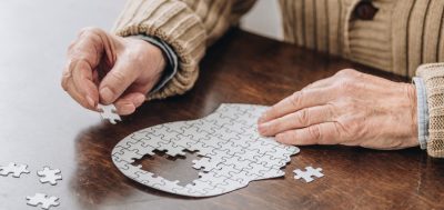 Someone Putting Together a Jigsaw Puzzle