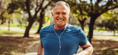 A Man Running While Listening to Music