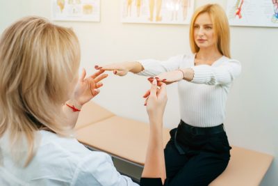 Woman meeting with a neurology specialist